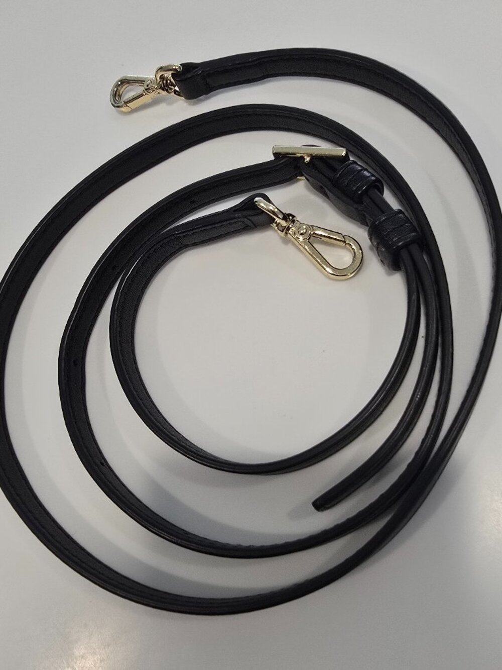 Tumi Black Leather/Goldtone Long Crossbody Strap 52" in Length